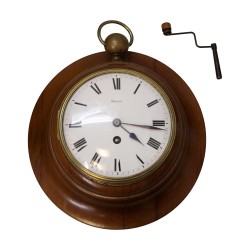 Directoire bull s eye in walnut wood, with its key, signed