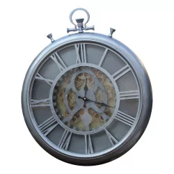 “Holmes” wall clock with visible mechanism.