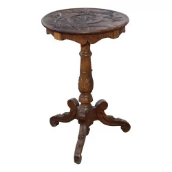 Brienz wooden pedestal table with carved decoration on …