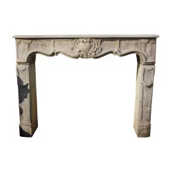 Louis XV fireplace in Charentaise stone with patina