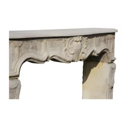 Louis XV fireplace in Charentaise stone with patina