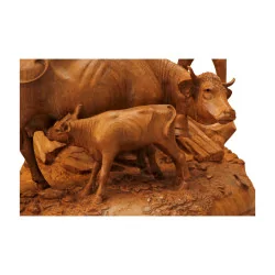 Wooden sculpture from Brienz representing a group of cows\"