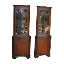 Pair of Regency style corner cupboards in flamed mahogany wood, …