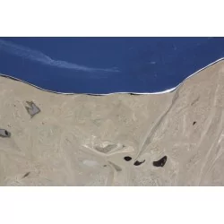 Tabouret en métal poli et chromé inspiré d'un tronc d'arbre ou …