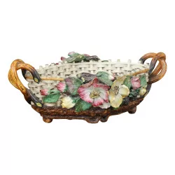 Earthenware basket from Barbotine with floral decoration. 20th …