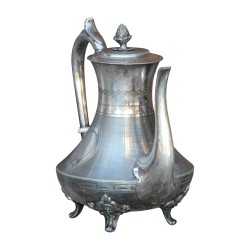 套银质茶具，包括 1 个茶壶和一个糖罐……