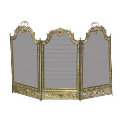 Louis XV firewall in embossed brass, with 3 shutters Around 1870, …