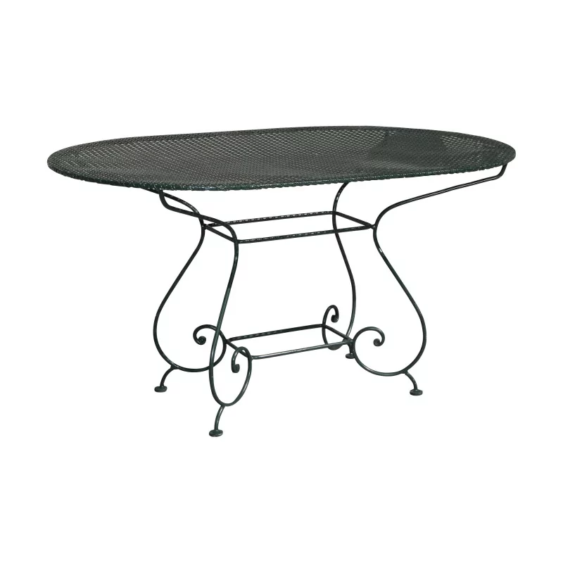 Table ovale modèle Vincy en fer forgé avec plateau en tôle - Moinat - Heritage