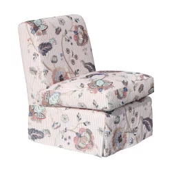把美国型号的壁炉椅，上面覆盖着 5 毫升的花卉织物。