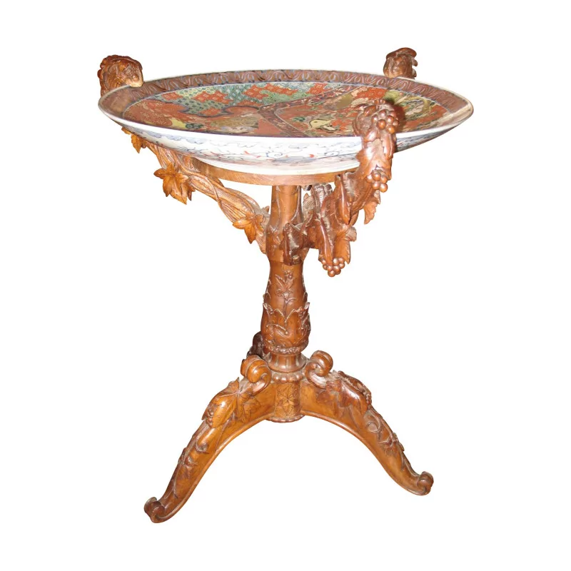 Table tripode composé d'un piétement en bois sculpté de Brienz … - Moinat - VE2022/3