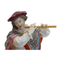Statue, die einen Flötenspieler in …