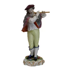 Statue representing a flute player in …