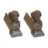 Pair of female face andirons in cast iron. 20th century - Moinat - Firedogs, Andirons