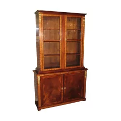 Pair of mahogany and magnifying bookcases, mounted on …