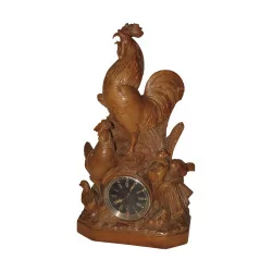 Uhr Brienz Coq aus geschnitztem Holz. Schweiz, 19. Jahrhundert.