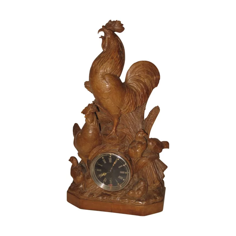 Uhr Brienz Coq aus geschnitztem Holz. Schweiz, 19. Jahrhundert. - Moinat - Tischuhren