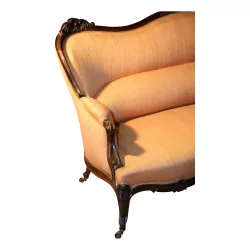 Napoleon III sofa in carved rosewood, covered in fabric