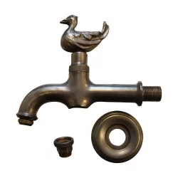 Duck fountain tap in blackened burnished brass.