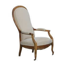 Voltaire model armchair in wood and covered with fabric …