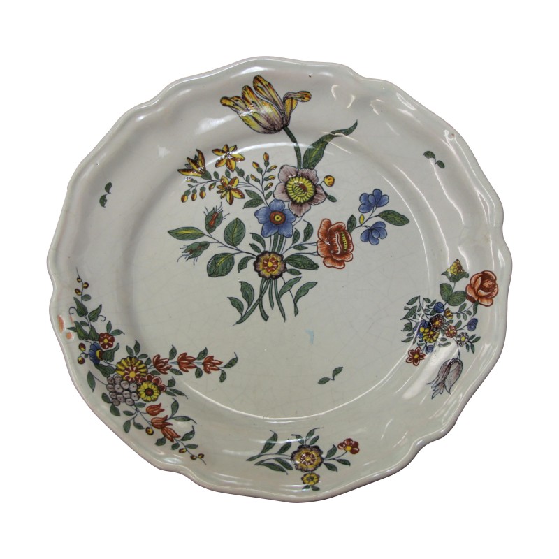 Assiette à bord contourné en faïence à décor polychrome d'un … - Moinat - Porcelaine Assiette à bord contourné en faïence à décor polychrome d'un … - Moinat - Porcelaine