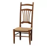 Stillstuhl aus Nussbaumholz und Sitzfläche aus Stroh. Schweizerisch, … - Moinat - Stühle