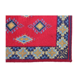 Tapis rectangulaire coloris rouge, jaune, bleu et marron sans …