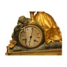 Pendulum Woman in gilded and black bronze with key. 20th century - Moinat - Table clocks