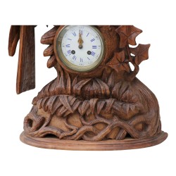 Carved Brienz wood clock representing an eagle,