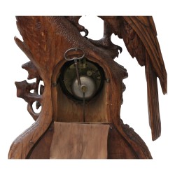 Carved Brienz wood clock representing an eagle,