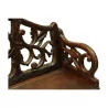 Bärenbank aus geschnitztem Holz im Brienzer Stil, mit Truhe … - Moinat - Brienz