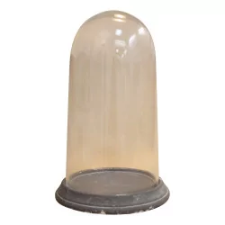 Glass bell on a gray plaster base. Switzerland, 20th century.