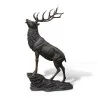 Stag that roars in brown patinated bronze, life-size on its … - Moinat - Statues