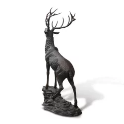 Stag that roars in brown patinated bronze, life-size on its …