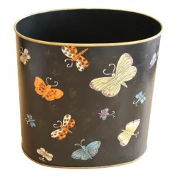 basket in black sheet metal with a decoration of butterflies