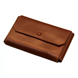 Hermes tool kit in brown leather.