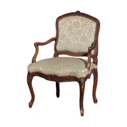Carved, molded armchair, upholstered seat and back (caned