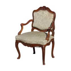 Carved, molded armchair, upholstered seat and back (caned