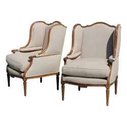 Paire de bergères Louis XVI en noyer