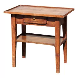 Kleiner rustikaler Nussbaumtisch mit Schublade und Holzplatte.