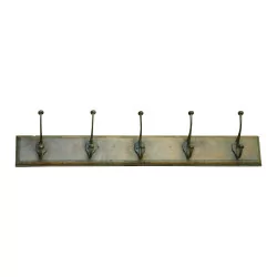 coat rack in green patinated wood with 5 hooks.