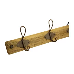 wooden coat rack with 4 hooks.