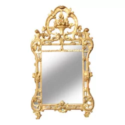 Miroir Louis XV en bois doré et glace au mercure. France,