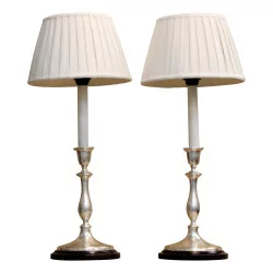 Pair of silver candlesticks transformed into a lamp. Lampshade in …