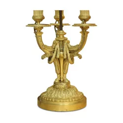 Paire de candélabre de style Louis XVI d'après un modèle de …