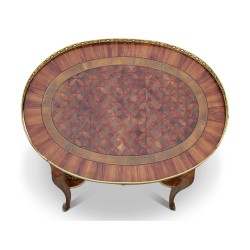 Oval bedside table, in marquetry of rosewood, lemon tree and …