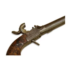 Pistol with burl walnut stock and guilloché breech. …