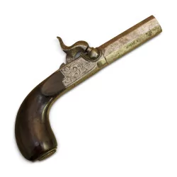 Pistol with engine-turned breech and walnut stock. Hallmarked…