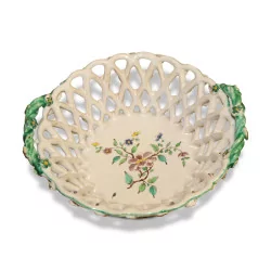 Openwork earthenware dish with floral decorations. France Sceaux, …