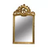 Miroir de Funk en bois sculpté doré à fronton ajouré d'une … - Moinat - Glaces, Miroirs