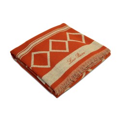 Plaid "Oasis" de Loro Piana colori piment doux et gris.